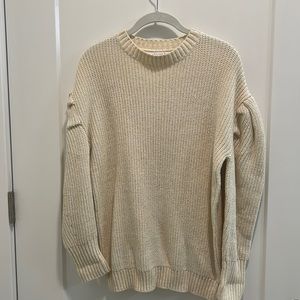 Cream sweater with puff sleeve detail